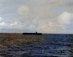 USS Coral Sea a short distance off Kwajalein Atoll, Marshall Islands, 1 Feb 1944; photo taken from USS Manila Bay