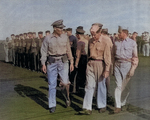 Captain George C. Montgomery inspecting USS Anzio, 16 Dec 1944, photo 1 of 2