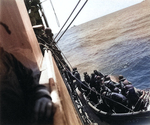 Fletcher in a whaleboat waiting to board cruiser Astoria after his flagship Yorktown had been disabled, 1300, 4 Jun 1942