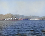 HMS Belfast in the channel at Busan, Korea, 2 Apr 1952; note hospital ship USS Consolation