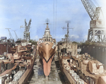 Destroyer Claxton, heavy cruiser Canberra, and destroyer Killen being repaired in floating drydock USS ABSD-2, Manus, Admiralty Islands, 2 Dec 1944