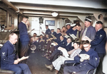 US Navy Chief Petty Officers aboard battleship Colorado studying 