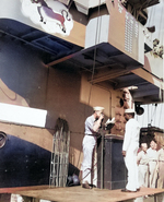 US Navy Captain Herbert W. Taylor of USS Cowpens awarding African-American Stewards Mate 3rd Class Fred Magee, Jr. with commendation of the Secretary of the Navy, Oct 1944