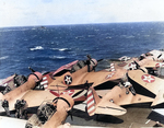 TBD-1 Devastator and F4F-3 Wildcat aircraft parked on Enterprise