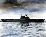 Enterprise entering Pearl harbor, 26 May 1942, following the Battle of Coral Sea and shortly before the Battle of Midway.