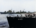 Hatsuzakura (background, with depressed guns) and USS Nicholas (foreground) off Tokyo Bay, Japan, 27 Aug 1945 prior to transfer of Japanese translators and harbor pilots to Nicholas; photo taken from USS O