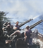 Gunnery practice with 40-mm Bofors MK 12 anti-aircraft guns aboard USS Hornet, Pacific Ocean, circa Feb 1945