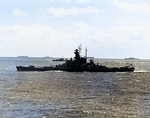 Battleship Indiana underway en route to attack Tokyo, Japan with Task Force 58.1, 12 Feb 1945; note ships of Task Group 58.3 in background