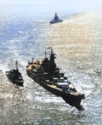 USS Missouri leading USS Iowa into Tokyo Bay, Japan, 30 Aug 1945, photo 1 of 2; note destroyer USS Nicholas in escort