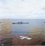 Battleships Iowa and Indiana underway during the Marshall Islands Campaign, 24 Jan 1944; note ships with Camouflage Measure 32 Design 1B and wing of SB2C Helldiver aircraft in foreground