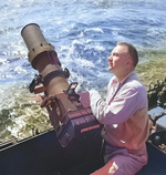 Lieutenant Commander Charles Fenno Jacobs with F-16 camera aboard USS Iowa, Dec 1944