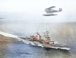 Light cruiser Köln underway, late 1930s; note He 60 floatplane flying above