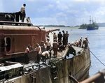 USS Marblehead at Tjilatjap, Java, Dutch East Indies, Feb 1942; note bomb damage