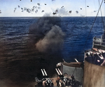 Gunners aboard USS Miami firing at Japanese aircraft, off Okinawa, Japan, 14 Apr 1945