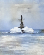 USS Miami prowing through a wave during her shakedown cruise, 17 Feb 1944; photo taken from USS Quincy