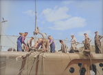 Shipyard workers installing engine parts onto a submarine, possibly the future USS Puffer, at Manitowoc, Wisconsin, United States, Aug 1942, photo 1 of 2