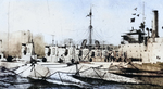 Submarines R-1, R-2, R-4, R-5, R-6, R-10, R-9, R-8, and R-7 tied to a submarine tender, 79th Street Boat Basin, New York City, New York, United States, 1920s