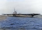 USS Sable at anchor in West Grand Traverse Bay, off Traverse City, Michigan, United States, 10 Aug 1943; note two TDN-1 assault drone on the flight deck