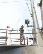 Raising the Chilean commission pennant on submarine Simpson, 21 Jan 1962