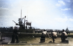 USS Sunfish flies her battle flag as she departs Pearl Harbor, US Territory of Hawaii, 29 Aug 1945; USS Pompon in foreground, photo taken from USS Pipefish