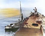 USS Wahoo providing food and water to crew of a becalmed fishing boat, circa Jan 1943; three fishermen had already died before being discovered by Wahoo