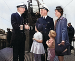 Rear Admiral W. L. Friedell greeting Lieutenant Commander Richard O