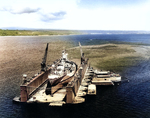 USS West Virginia in floating drydock USS ABSD-1 off Aessi Island, Espiritu Santo, New Hebrides, 13 Nov 1944