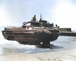 US Army DUKW loaded with oil drums coming ashore at Gela, Sicily, Italy, Jul 1943