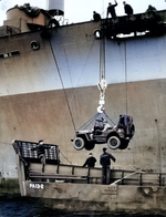 A Jeep being lowered into an LCM from Attack Transport USS Joseph T. Dickman (APA-13 – former SS President Roosevelt), manned by USCG personnel off Normandy, June 1944. Photo 1 of 2