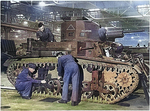 British workers working on a M2A4 light tank that had just arrived from the United States, circa 1941