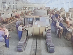 Workers putting tracks onto a M3 tank at the Detroit Arsenal Tank Plant, Warren, Michigan, United States, circa 1940-1942, photo 1 of 2