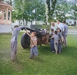 Civilians looking at a French-built 75mm field gun, Bristol, Vermont, United States, Jul 1940