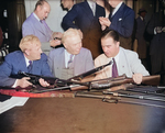 US Senator Morris Sheppard, Major General George Lynch, and Senator A. B. Chandler comparing M1941 Johnson rifles and the M1 Garand rifles, Washington, DC, United States, 29 May 1940