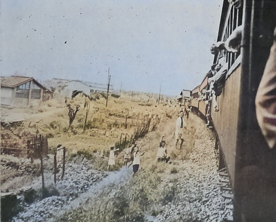 Former American prisoners of war being transported from Taihoku (now Taipei) to Kiirun (now Keelung), Taiwan, 5 Sep 1945 [Colorized by WW2DB]