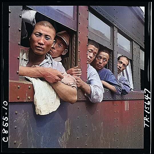 Japanese troops returning home aboard a train after the end of the Pacific War, Japan, Sep 1945 [Colorized by WW2DB]