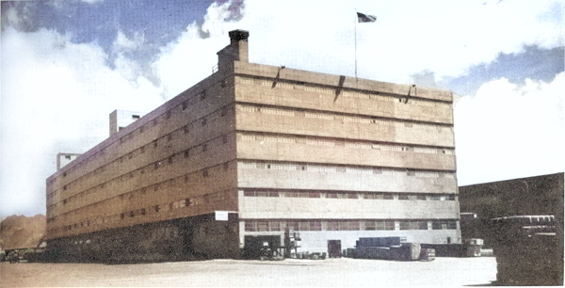 A reinforced concrete storehouse building at the Naval Supply Depot at Pearl Habor, Oahu, US Territory of Hawaii, date unknown [Colorized by WW2DB]