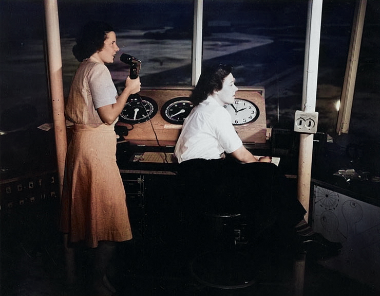WAVES Specialist 3rd Class Nora Scott and Specialist 3rd Class Virginia Chenoweth at work at the control tower of Naval Air Station, Charleston, South Carolina, United States, spring 1945 [Colorized by WW2DB]