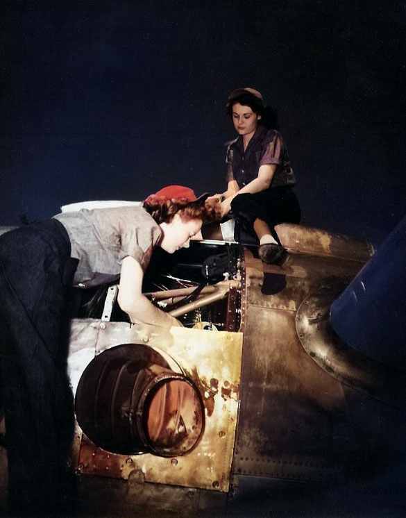 WAVES Seamen 1st Class Martha Harrison and Lorrain Taylor working on the #1 Pratt & Whitney R-2000 engine of a R5D Skymaster aircraft, Naval Air Station, Oakland, California, United States, mid-1945 [Colorized by WW2DB]