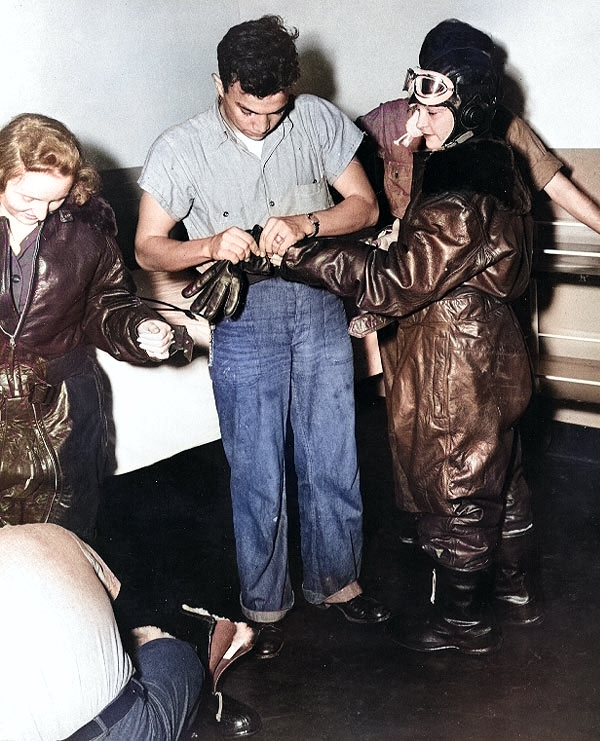 WAVES personnel putting on leather flight gear in preparation of a flight simulation,  Naval Air Station, Jacksonville, Florida, United States, 15 Oct 1943 [Colorized by WW2DB]