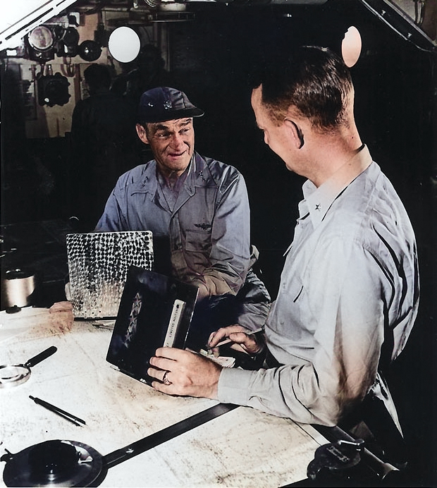 Vice Admiral Mitscher and Commodore Burke aboard carrier Randolph off Okinawa, Japan, 1945, photo 1 of 2 [Colorized by WW2DB]