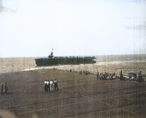 USS Coral Sea during an exercise, seen from USS Manila Bay, 13 Jan 1944 [Colorized by WW2DB]