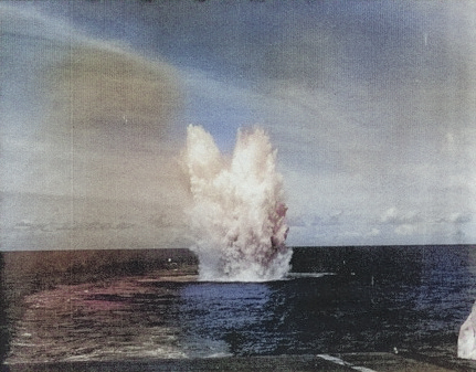 TBF-1C aircraft exploding in water near USS Coral Sea, 20 Mar 1944 [Colorized by WW2DB]