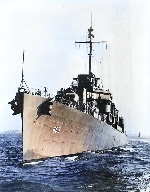 Cotten, circa Jul 1943 off New York City, when she was first completed; note the photo had been retouched by war-time censors to remove radar antennas and Mark 37 gun director, photo 1 of 2 [Colorized by WW2DB]