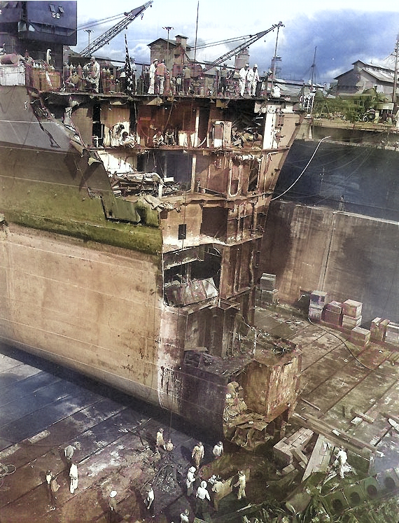 Battleship Washington in drydock at Pearl Harbor Navy Yard to repair collision damage sustained from battleship Indiana in the previous month, US Territory of Hawaii, Mar 1944 [Colorized by WW2DB]