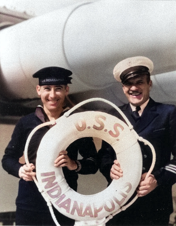 Crewmen of Indianapolis holding her life ring, circa 1935 [Colorized by WW2DB]