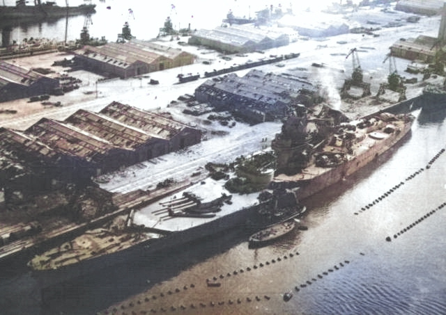 Jean Bart viewed from an aircraft of USS Ranger, Casablanca, French Morocco, 11 Nov 1942, photo 2 of 3 [Colorized by WW2DB]