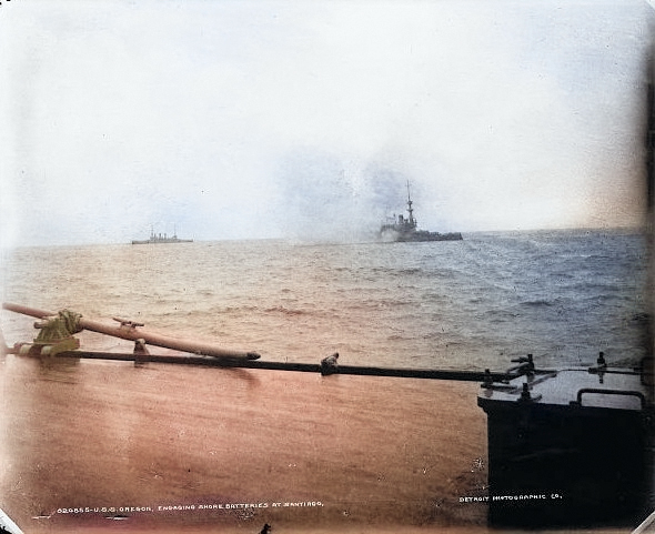 USS Oregon bombarding Spanish shore batteries at Santiago, Cuba, 1898 [Colorized by WW2DB]