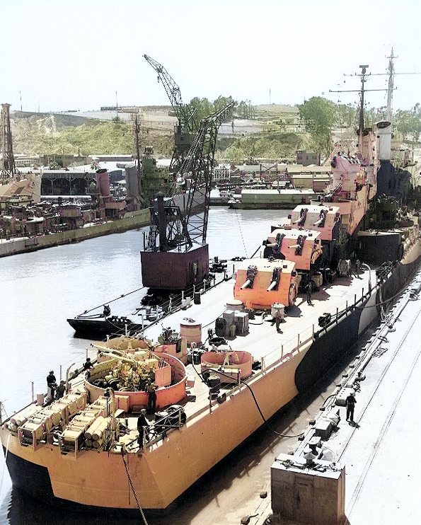 USS San Diego at Mare Island Naval Shipyard, Vallejo, California, United States, 9 Apr 1944, photo 2 of 2; note camouflage Measure 33, Design 24d; USS Cassin in background [Colorized by WW2DB]