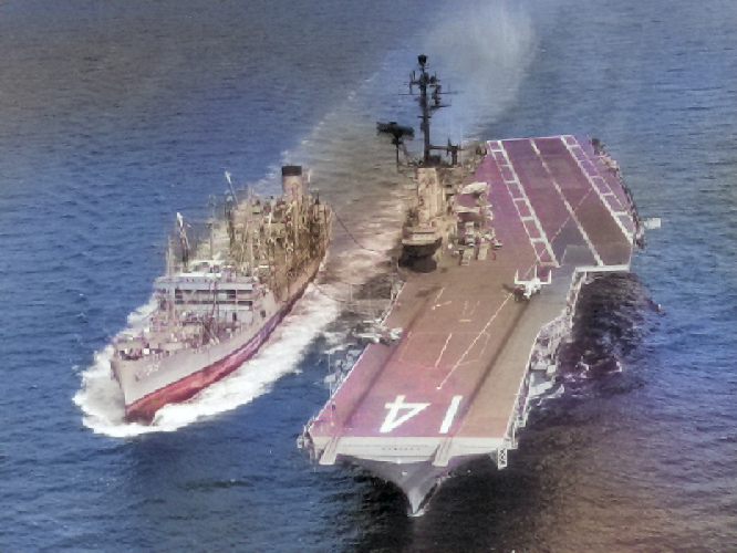 USS Ticonderoga receiving fuel from USS Manatee, 15 Jul 1965 [Colorized by WW2DB]