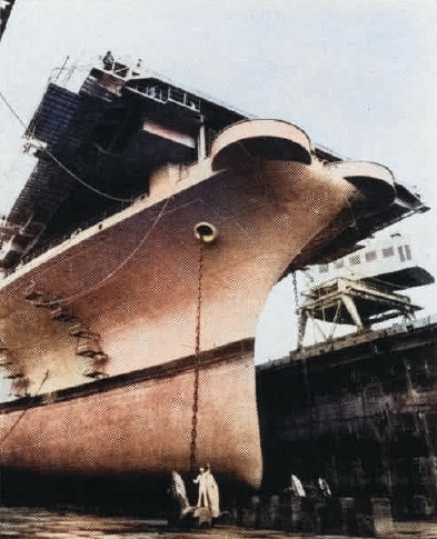 USS Ticonderoga in a drydock, mid-1950s; seen in Jan 1956 edition of US Navy publication Naval Aviation News [Colorized by WW2DB]